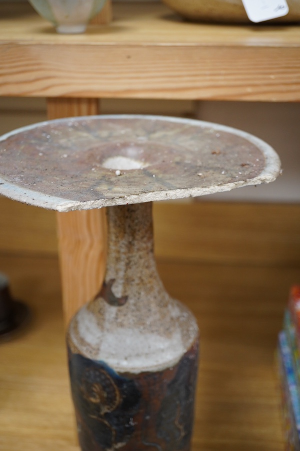 Eric James Mellon (1925-2014), a figural bottle vase, top rim chipped, inscribed to the base, together with a signed fragment, largest 42cm high